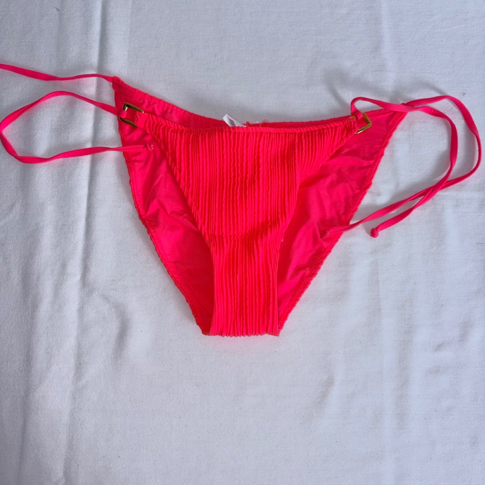 BECCA Bikini Bottom Medium Neon Pink red NEW Textured Side Tie Gold Hardware